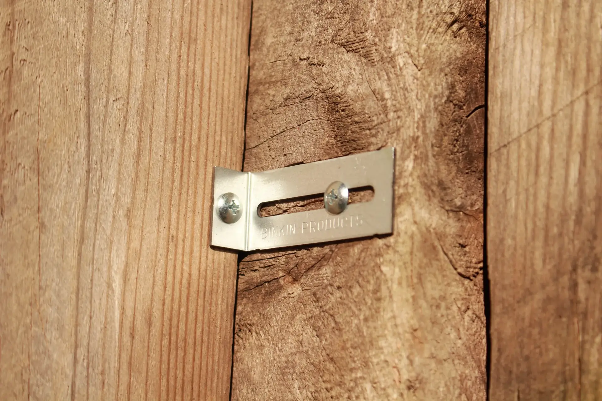 BINKIN bracket locked in place on a fence
