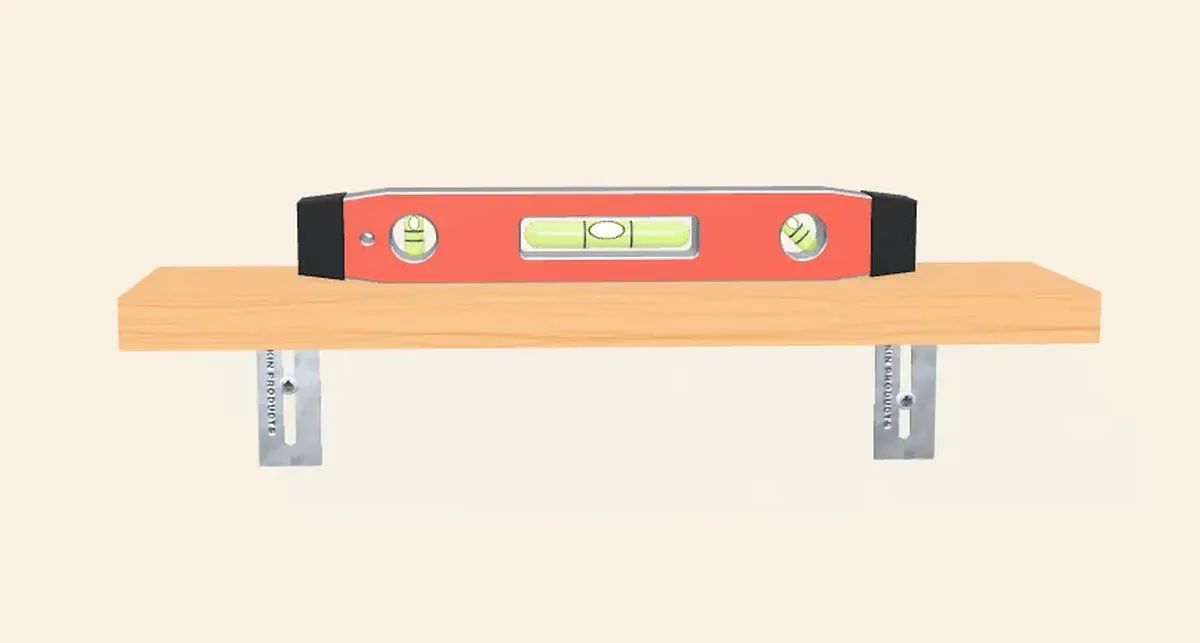 A 3D render of a shelf on two BINKIN slotted brackets with a level on top, bubble centred