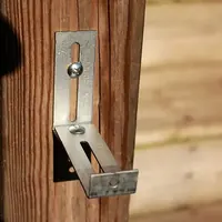 Two BINKIN brackets joined through their slots on a fence post, extending the reach
